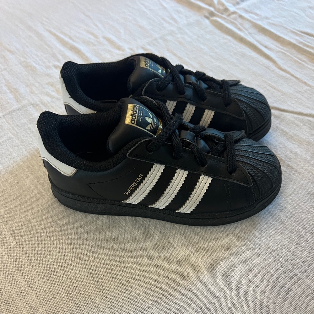 Adidas superstar black sneakers